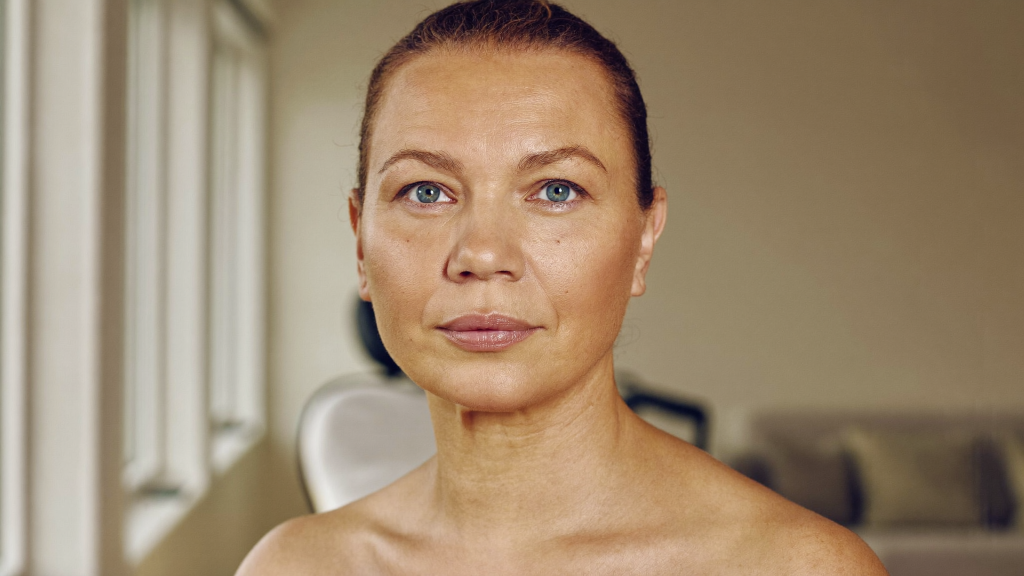 Woman with radiant, naturally rejuvenated skin after Sculptra at SIX1 Aesthetics in Bracknell and Alderley Edge